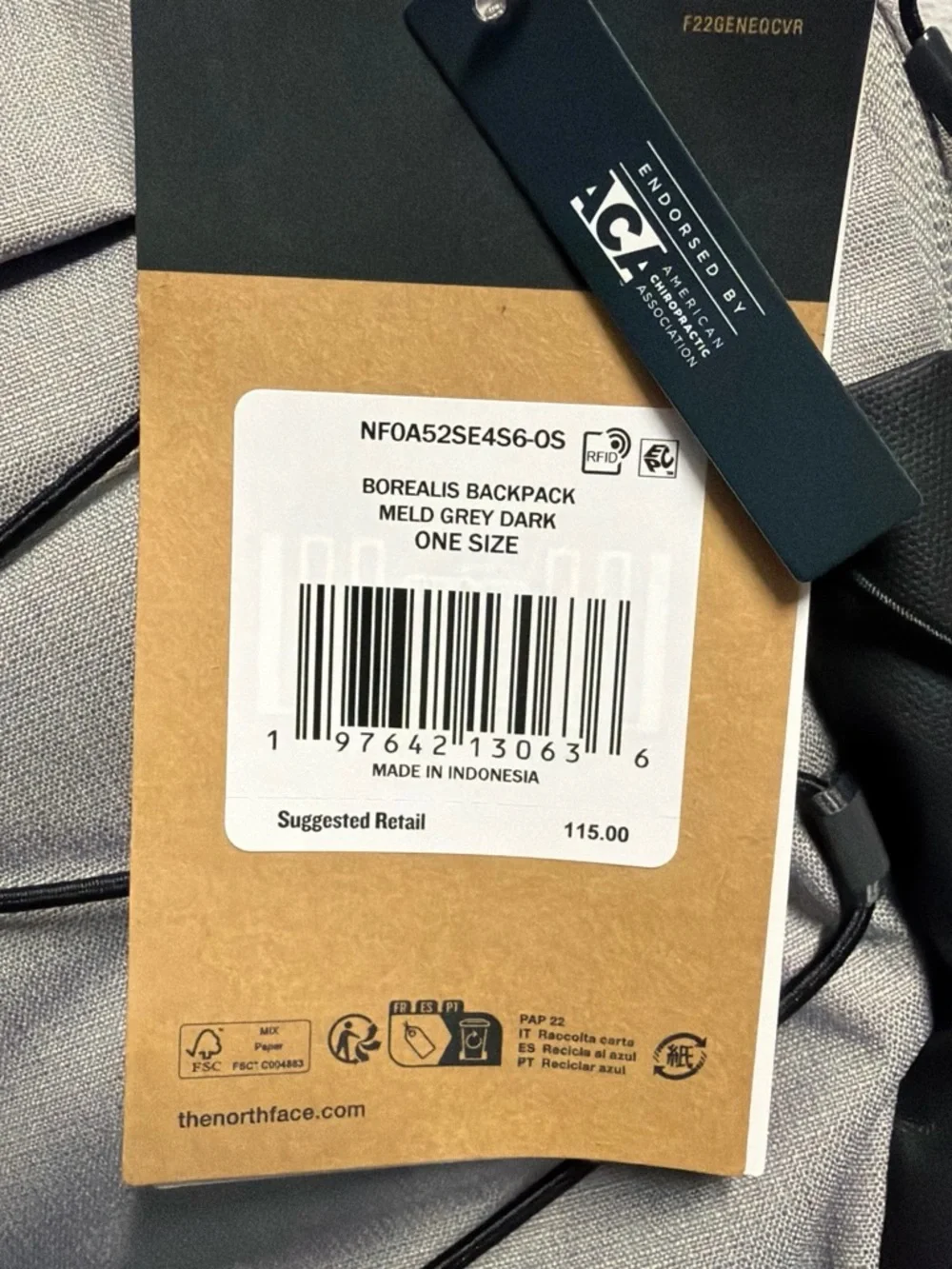 The North Face Light Gray and Black Backpack with Bungee Front